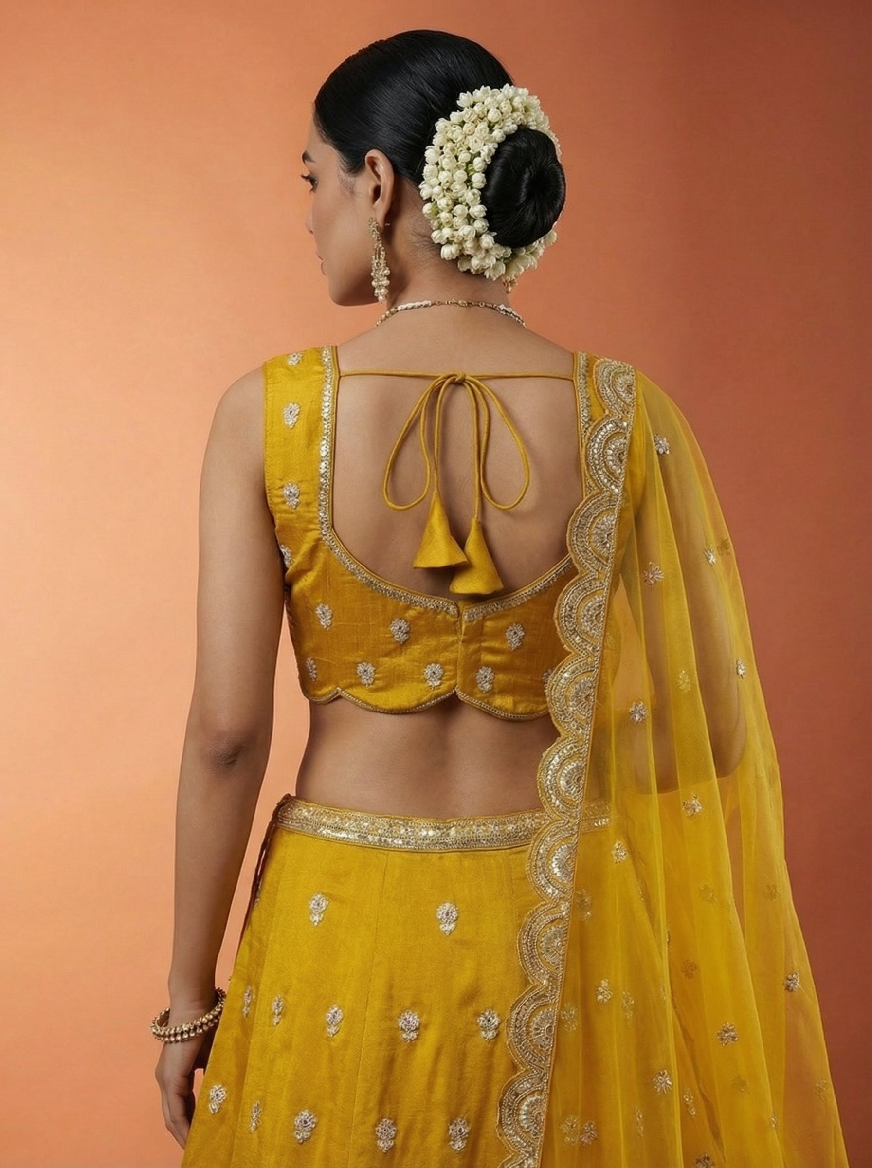 Mustard Chinnon Silk Lahenga with Motif Sequince Embroidery