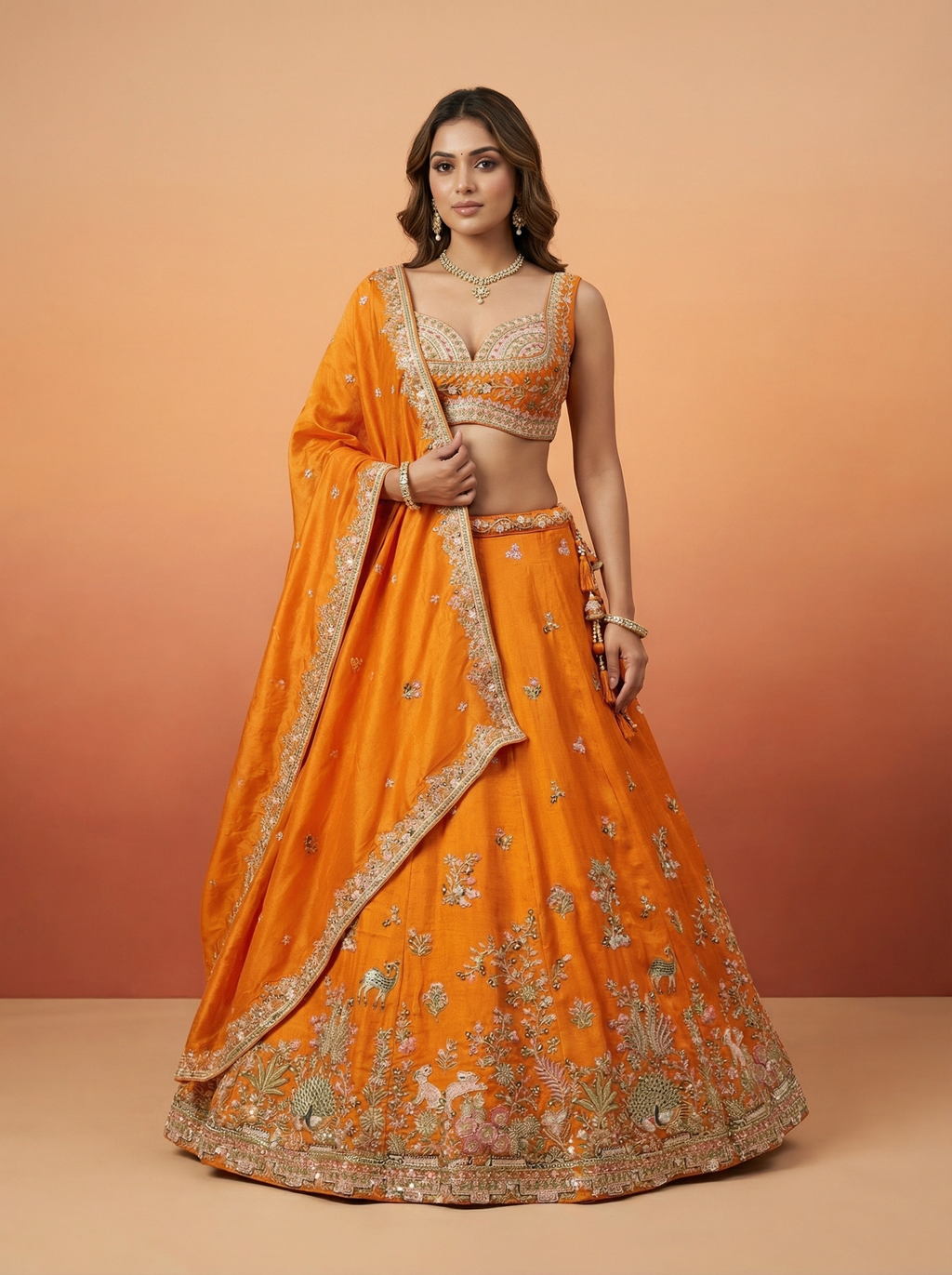 Orange Tissue Lahenga with colourful Peacock Embroidery