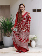 Elegant Red Printed Saree with Intricate Ethnic Motifs